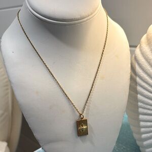 Unique gold necklace with charm NWT